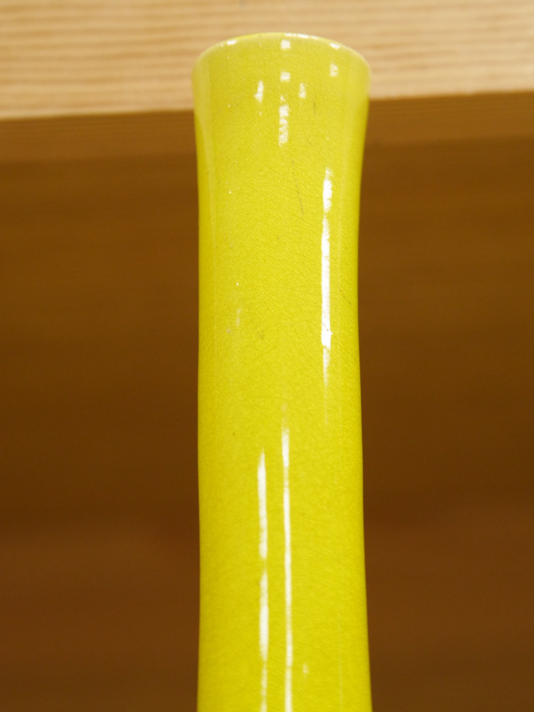 A Chinese or Japanese monochrome yellow bottle vase, 32cm high. Condition - crazed